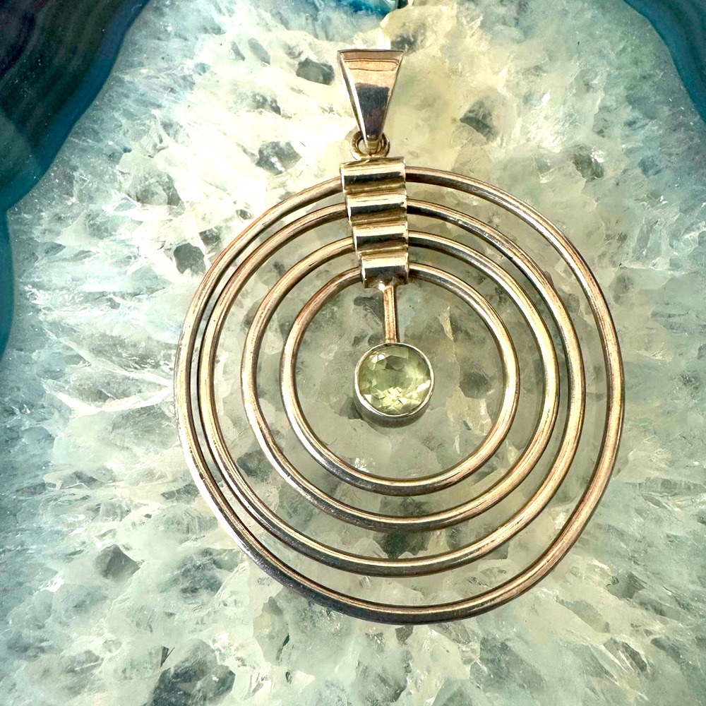 Articulated infinity circles pendant in sterling silver